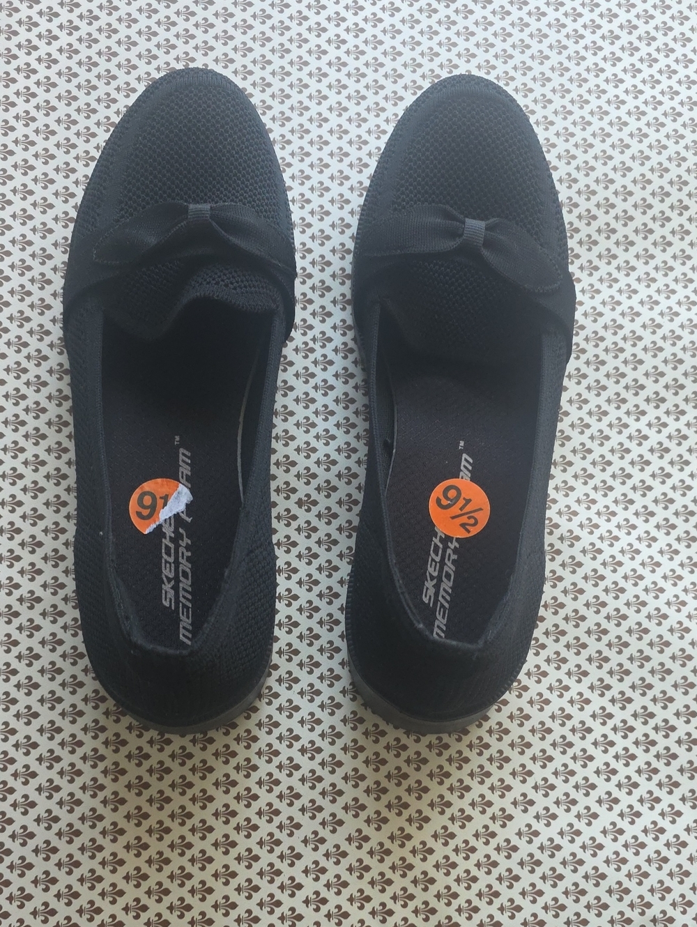 Skechers Black Slip-On Knit Loafers with Bow Accent